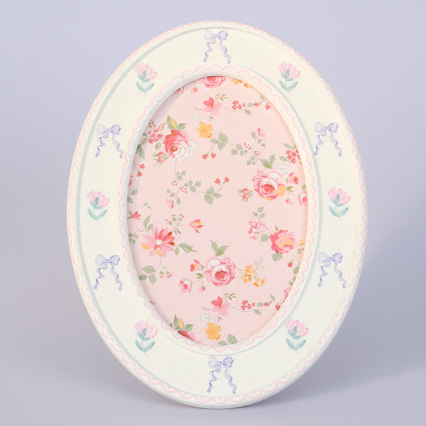 PORTA RETRATO OVAL FLORES 14X9